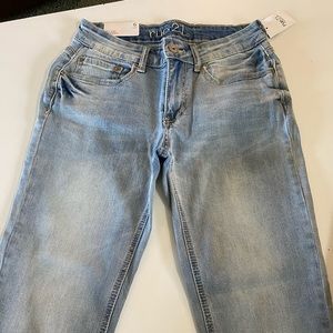 Blue skinny pants. Size 6. New